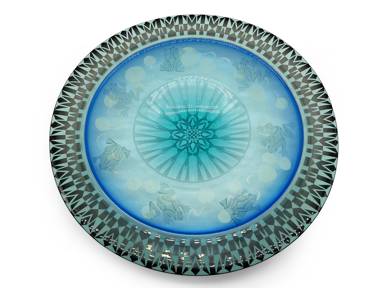 Gary Genetti Etched Art Glass Charger: A Gary Genetti etched art glass charger with frog and vine design. 15in diameter. | Philadelphia Metro area delivery, NYC curbside delivery, and international third-party shipper information are all a