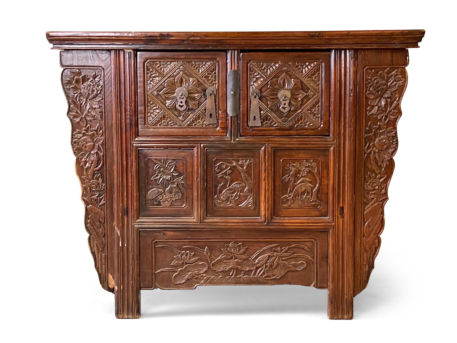 Chinese Qing-style Carved Cabinet: A Chinese Qing-style carved cabinet with a rectangular top over a case with two drawers. 33-1/2in tall x 42-1/2in wide x 28-1/4in deep. Provenance: from the restaurant and private collections of Marga