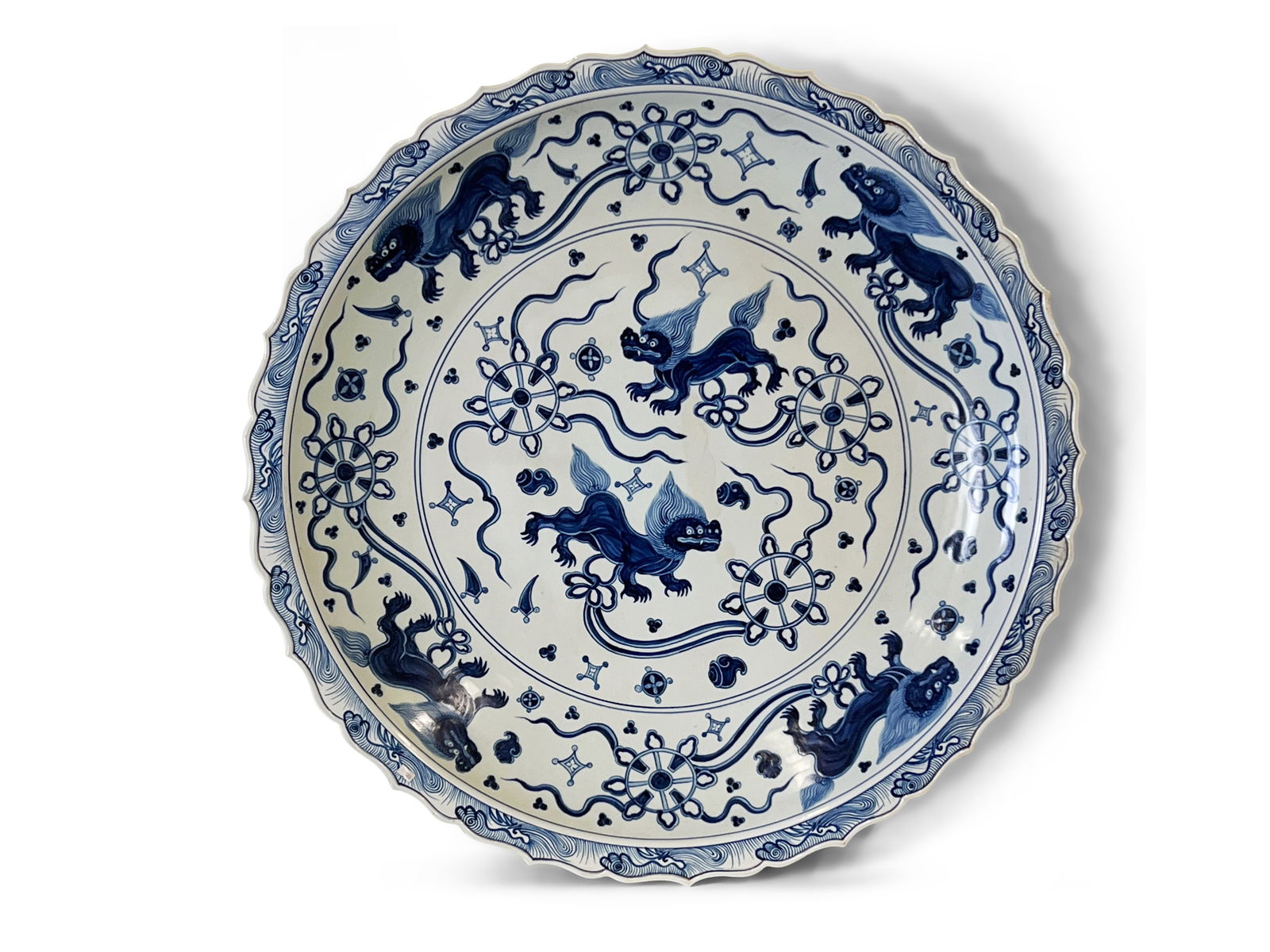 Monumental Chinese Blue and White Charger: A monumental Chinese Kangxi-style blue and white charger with foo dog design. 40in diameter. | Philadelphia Metro area delivery, NYC curbside delivery, and international third-party shipper informatio
