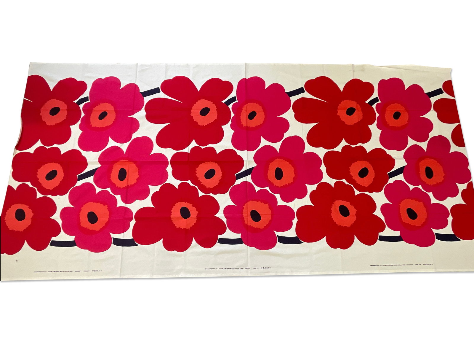 3.3 Yards of Marimekko Uniko Flower Fabric: A Marimekko Uniko flower print fabric, circa 1965. 57-1/2in tall x 120in wide. | Philadelphia Metro area delivery, NYC curbside delivery, and international third-party shipper information are all avai