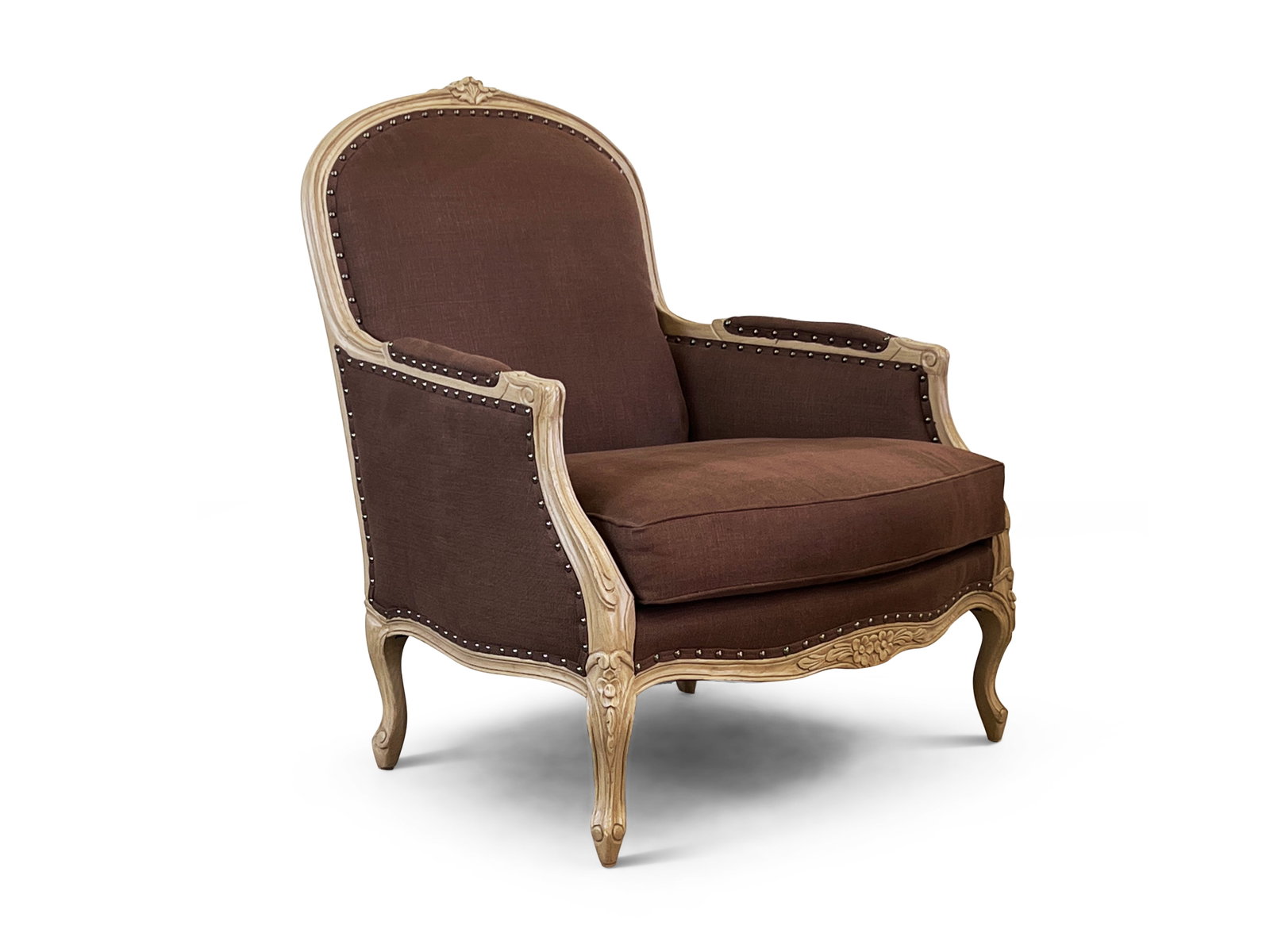 Vanguard Louis XV-style Bergère Lounge Chair: A Vanguard Louis XV-style carved bergère lounge chair with brown upholstery and studded trim. 40-1/2 in 34in wide x 33in deep. | Philadelphia Metro area delivery, NYC curbside delivery, and internati