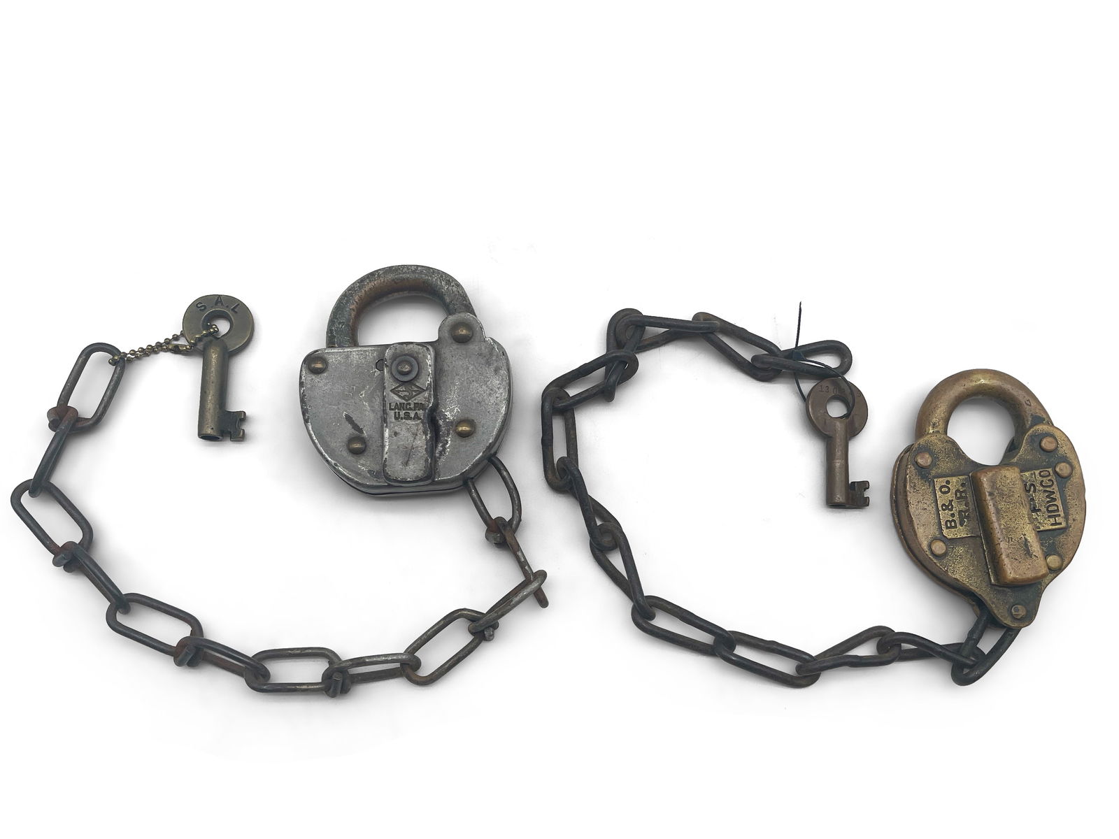Two Railroad Switch Locks and Keys: Grouping of a Baltimore & Ohio switch lock with key and a Louisville & Nashville lock with key. Larger: 4in tall x 3in wide. | Philadelphia Metro area delivery, NYC curbside delivery, and internationa
