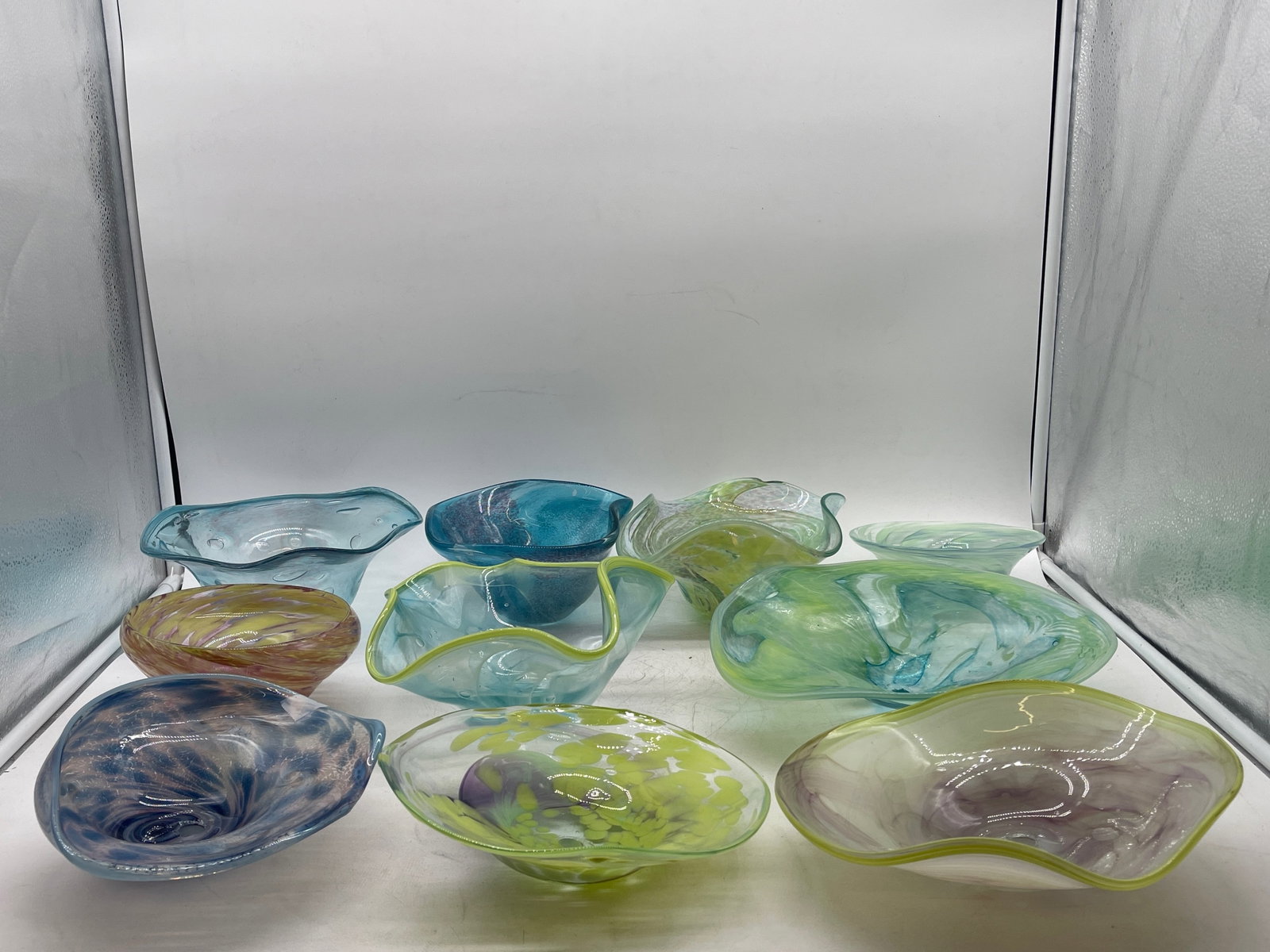 Ten Organic-form Art Glass Elements: Ten organic-form art glass elements, each with drilled center. Largest: 10-1/2in diameter. | Philadelphia Metro area delivery, NYC curbside delivery, and international third-party shipper information 