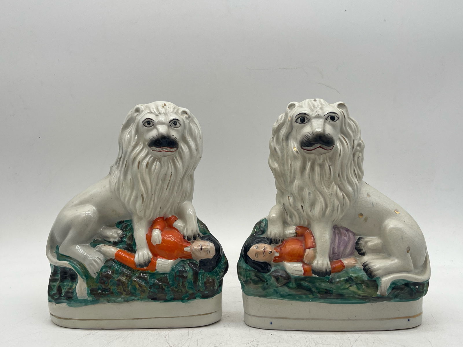 Pair of Staffordshire Lion and Napoleon Figures (1 of 4)