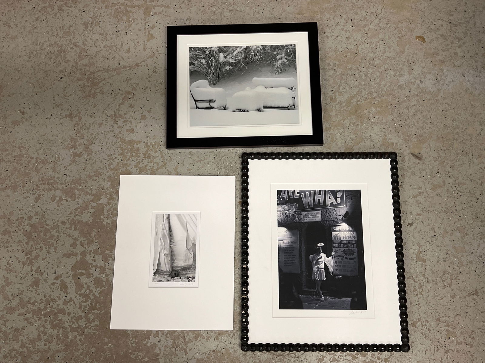Three Framed Photographs: A grouping of three framed photographs to include a Don Kirby silver gelatin print titled "Anasazi Ruin, Utah, 1997"; an illegibly signed photograph, "Cafe Wha, Greenwich Village", in an Ursula Hobson