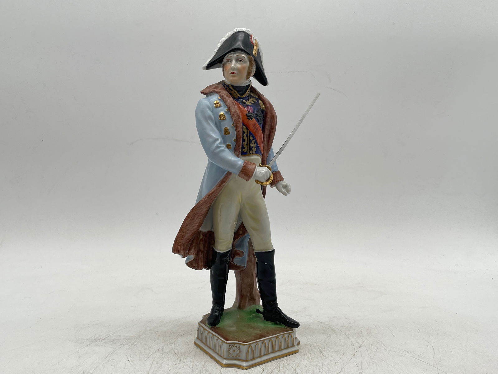 Dresden Carl Thieme Napoleon Figurine: A Dresden Carl Thieme porcelain Napoleon with sword figurine. Marked on base. 12in tall x 3-1/2in wide. | Philadelphia Metro area delivery, NYC curbside delivery, and international third-party shipper