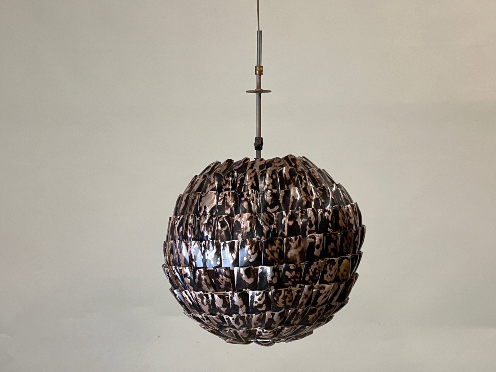 Moon Shell Hanging Pendant Lamp: A modernist moon shell hanging pendant lamp of orb form. Approx. 16in diameter. | Philadelphia Metro area delivery, NYC curbside delivery, and international third-party shipper information are all ava