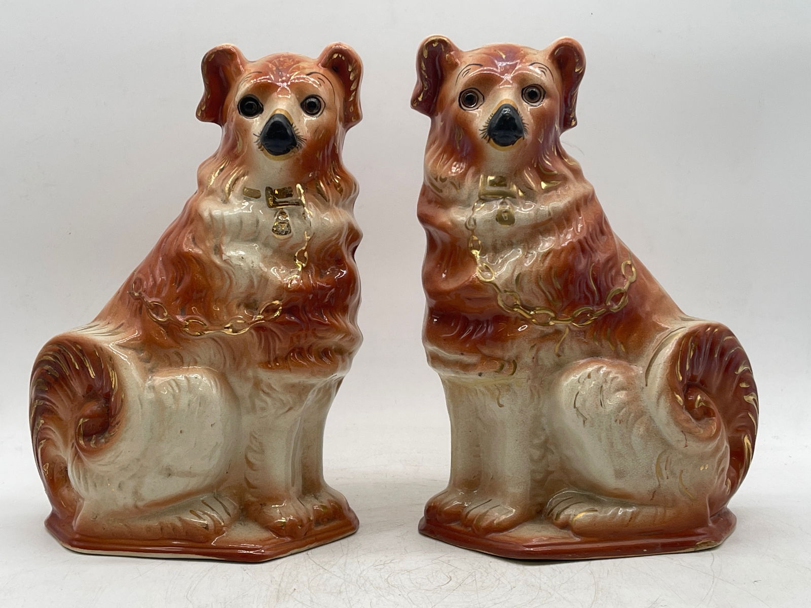 Pair of Staffordshire Wally Dog Figures: A pair of Staffordshire Wally dog figures. 13in tall x 8-1/2in wide. | Philadelphia Metro area delivery, NYC curbside delivery, and international third-party shipper information are all available on o