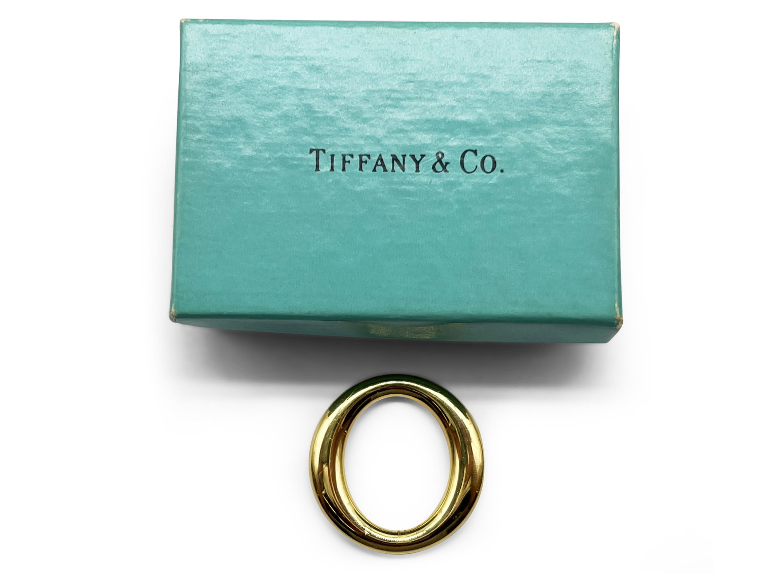 Elsa Peretti for Tiffany & Co. 18K Sevilana Pendant: An Elsa Peretti for Tiffany & Co. 18K yellow gold Sevilana pendant. 1-1/2in diameter. 5.0 dwt. | Philadelphia Metro area delivery, NYC curbside delivery, and international third-party shipper informat