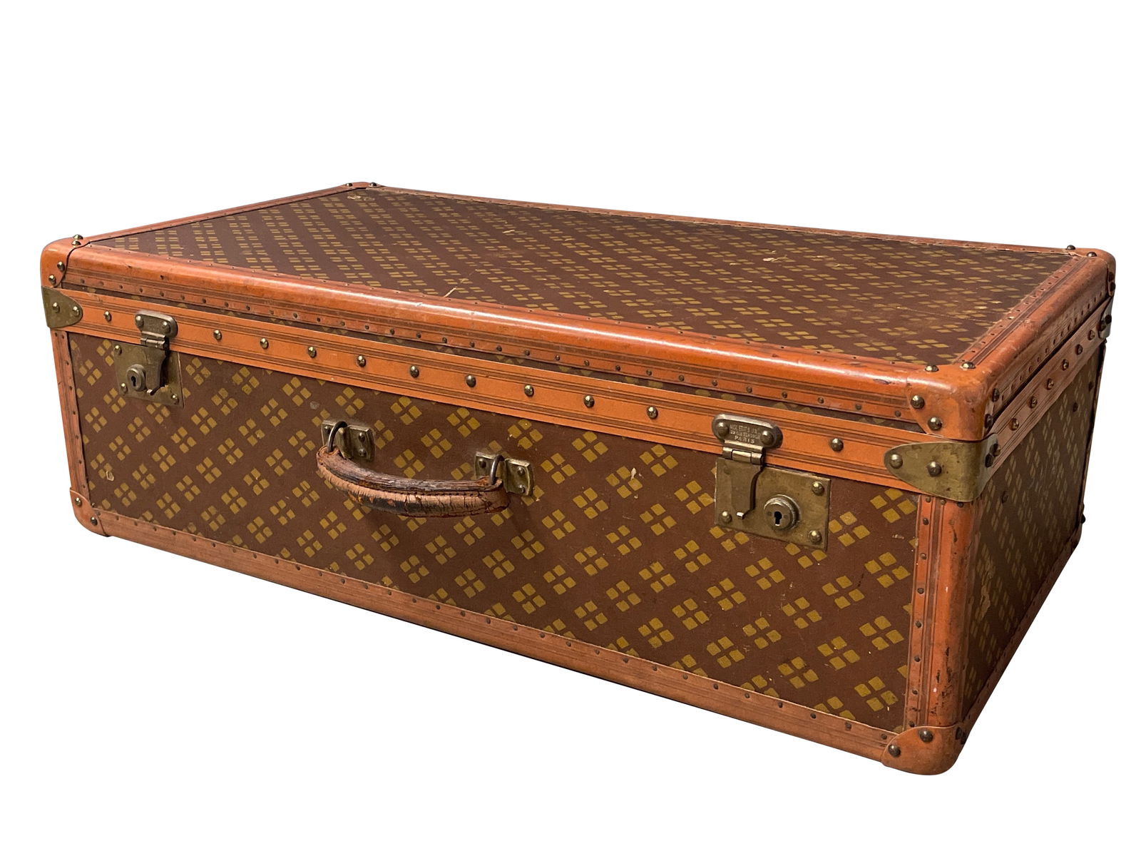 Aux Etats Unis French Monogram Trunk: An Aux Etats Unis French travel trunk with leather and brass detail. Numbered 177 and labeled on hardware. 17in tall x 31in wide. | Philadelphia Metro area delivery, NYC curbside delivery, and interna
