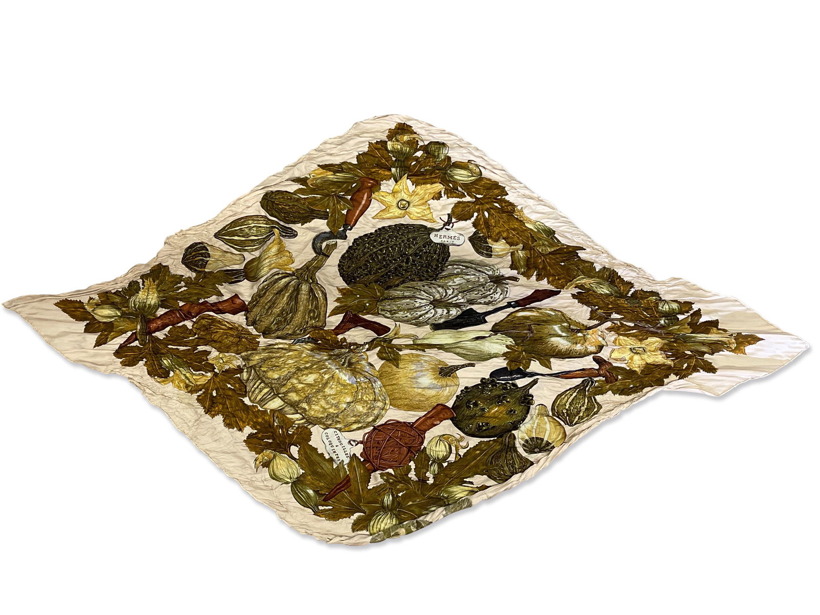 Hermès Citrouilles Coloquintes Scarf: An Hermès Paris Citrouilles Coloquintes silk plisse scarf with autumnal gourd motif. Marked Hermès Paris at center. 28in tall x 52in wide. | Philadelphia Metro area delivery, NYC curbside delivery,