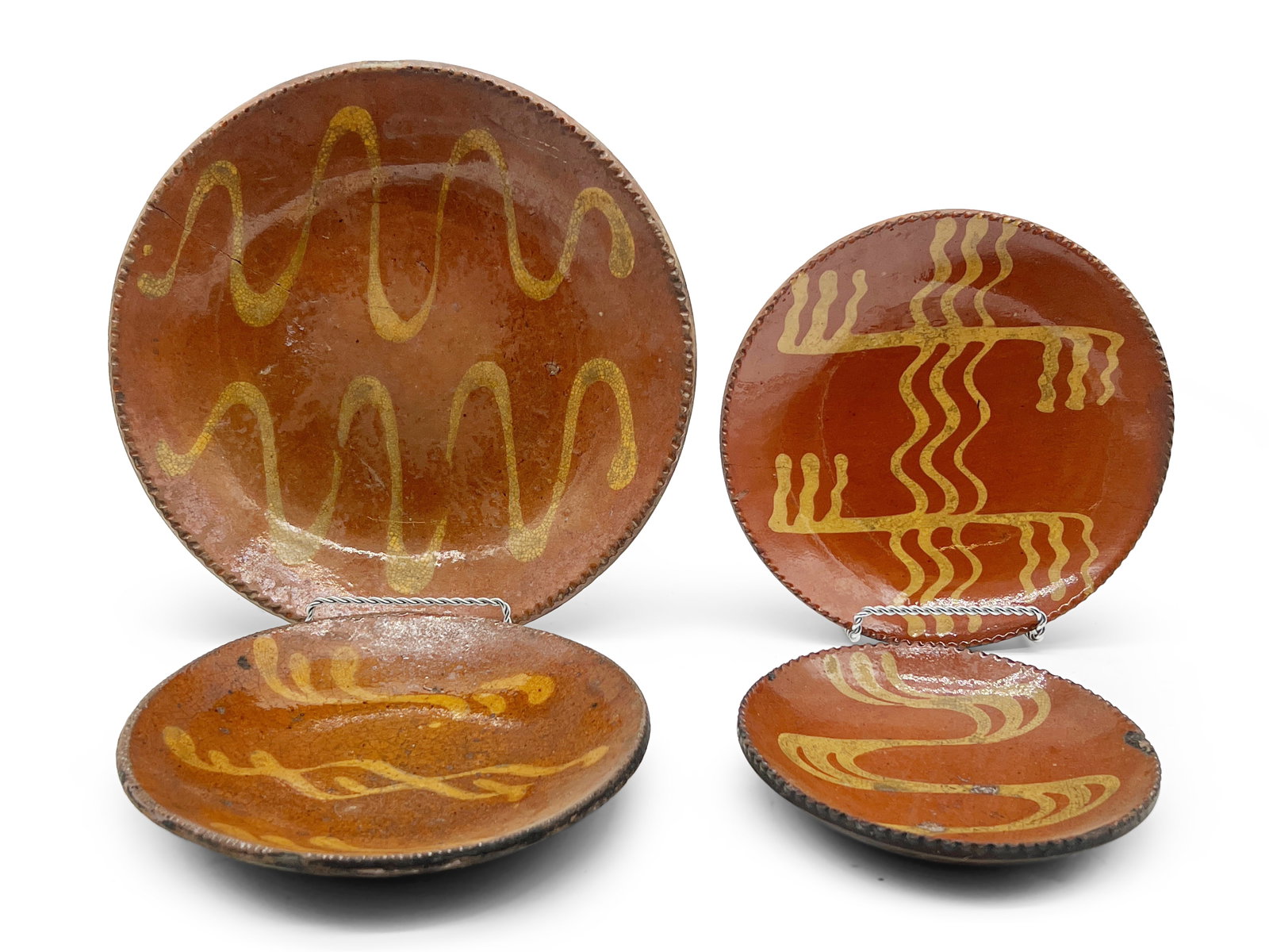 Four Pennsylvania Slip-Decorated Redware Plates (1 of 6)