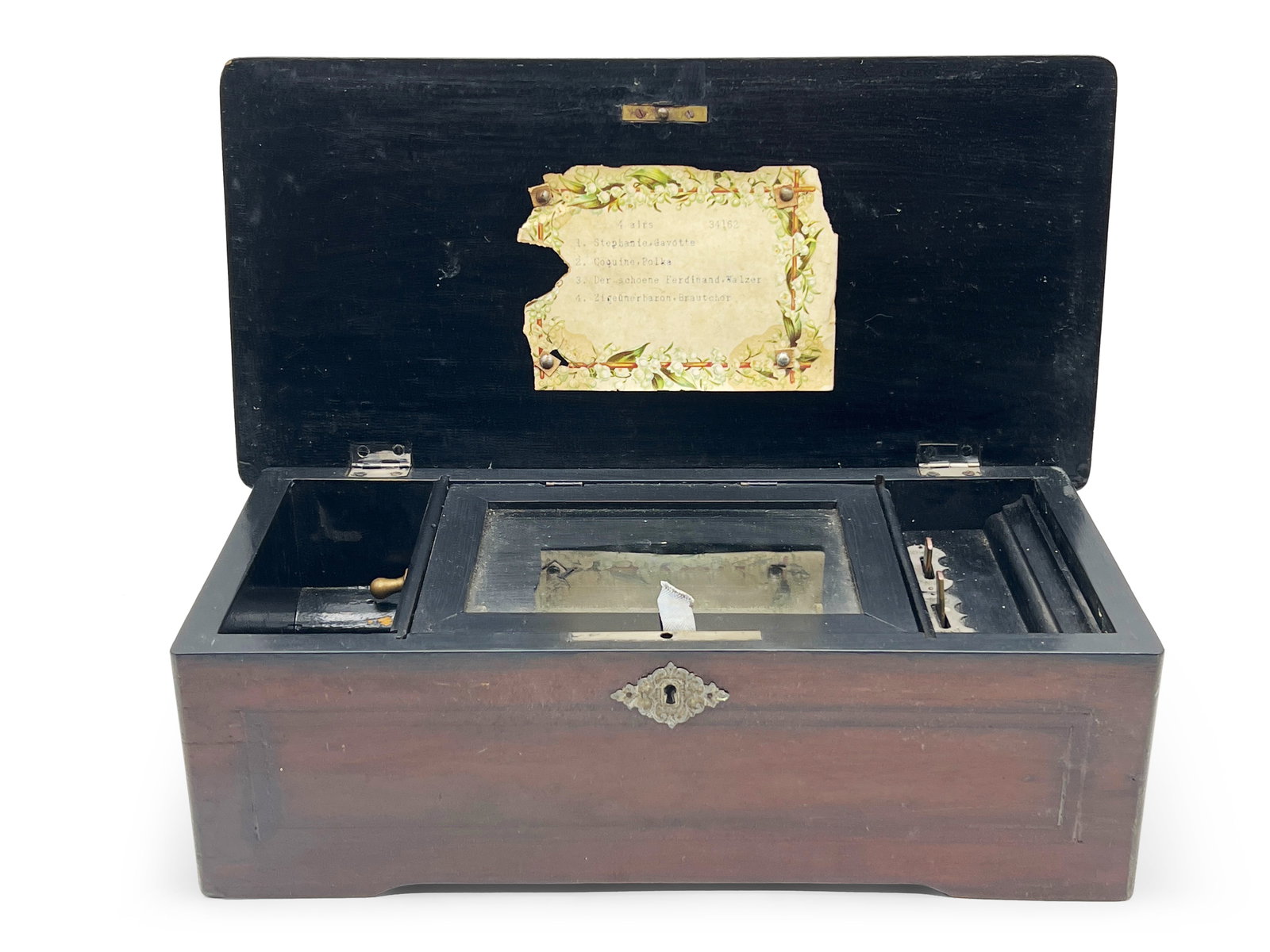 Swiss Cylinder Music Box: A Swiss cylinder music box. Does not hold the spring when cranked. 5in tall x 14in wide x 7in deep. | Philadelphia Metro area delivery, NYC curbside delivery, and international third-party shipper inf