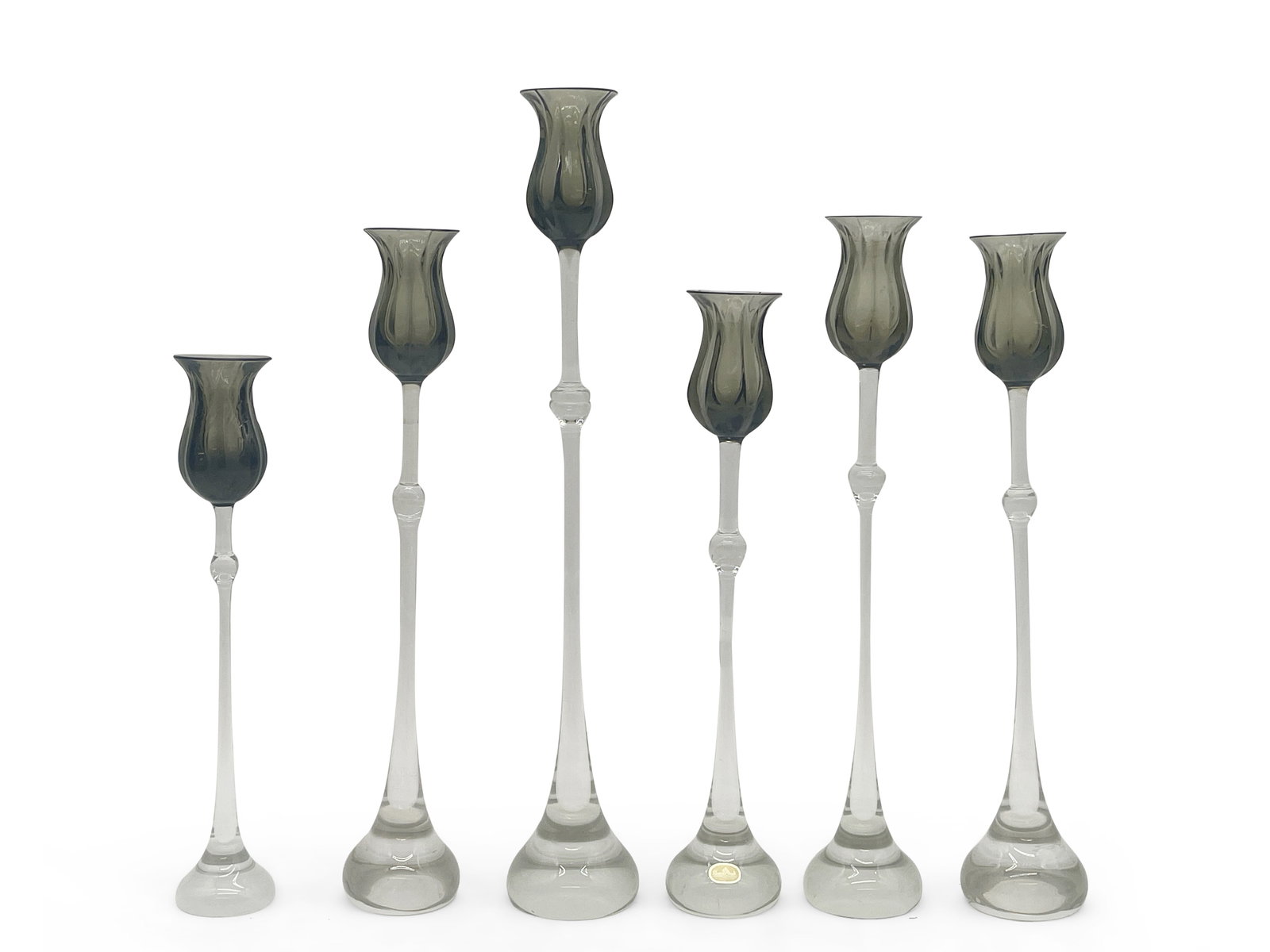 Six Bjorn Wiinblad for Rosenthal Tulip Candlesticks: Six Bjorn Wiinblad for Rosenthal art glass tulip-form candlesticks with smoked glass candle cups. Marked "R"; some have Rosenthal sticker. Largest: 15in tall x 2-1/2in wide. | Philadelphia Metro area