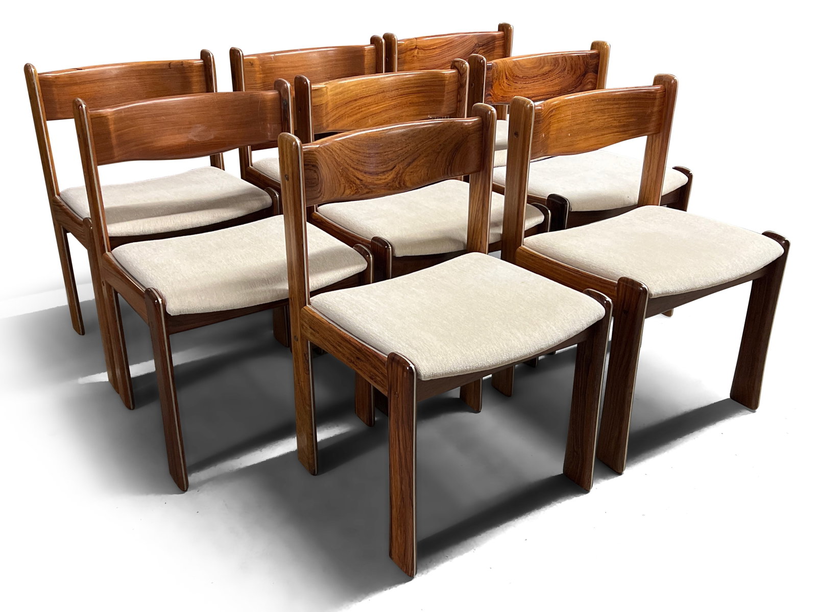 Eight Danish Rosewood Dining Chairs: A set of eight Danish modern rosewood dining chairs with chrome inlaid frames. 30-1/2in tall x 19-1/2in wide x 17-1/2in deep. | Philadelphia Metro area delivery, NYC curbside delivery, and internation