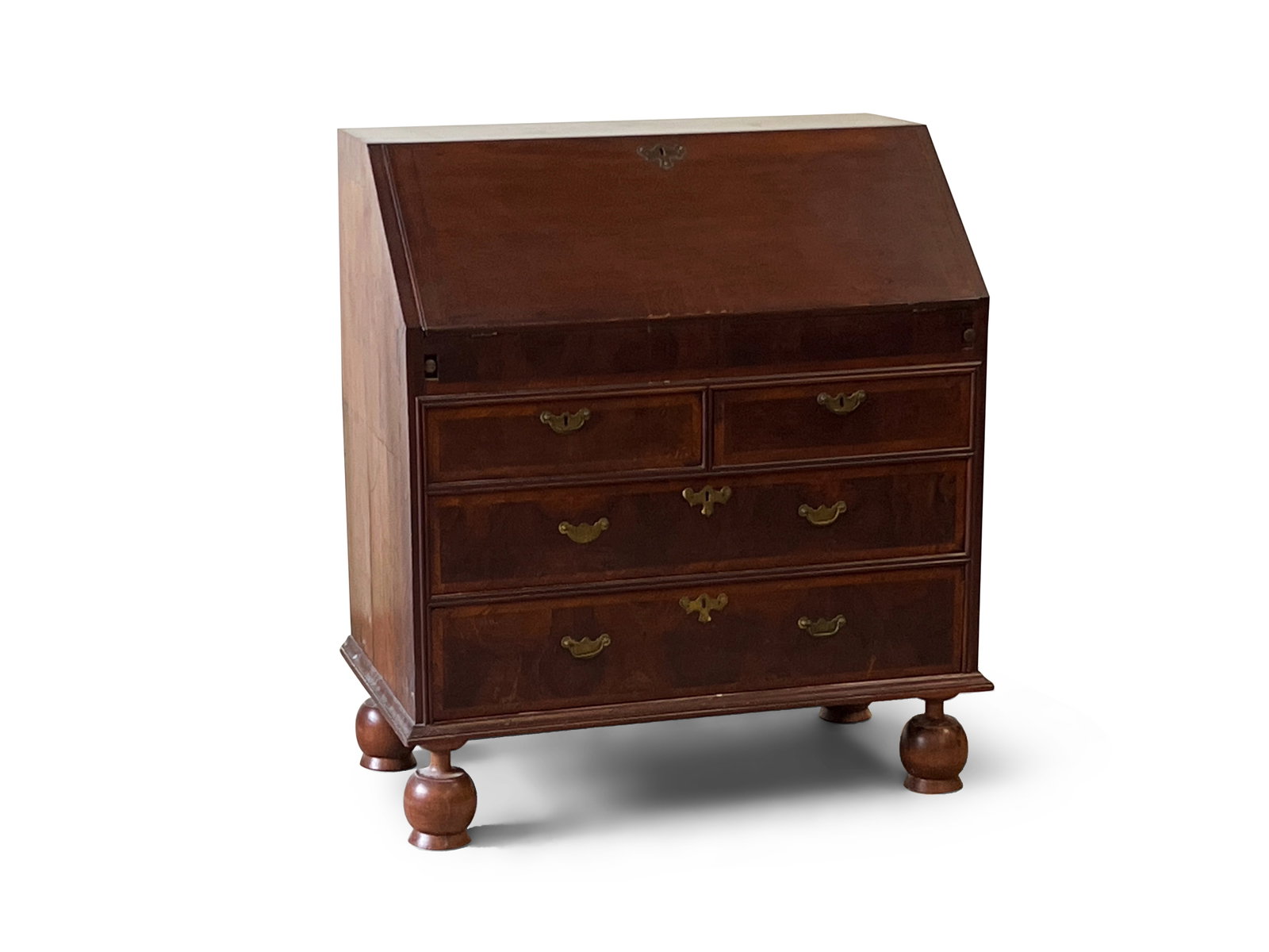 William & Mary Slant-Lid Desk: A William & Mary mixed-wood slant-lid desk with a fitted interior and case, two-over-two drawer arrangement, and layer turned feet. 40-1/2in tall x 35-1/2in wide x 20in deep. | Philadelphia Metro area
