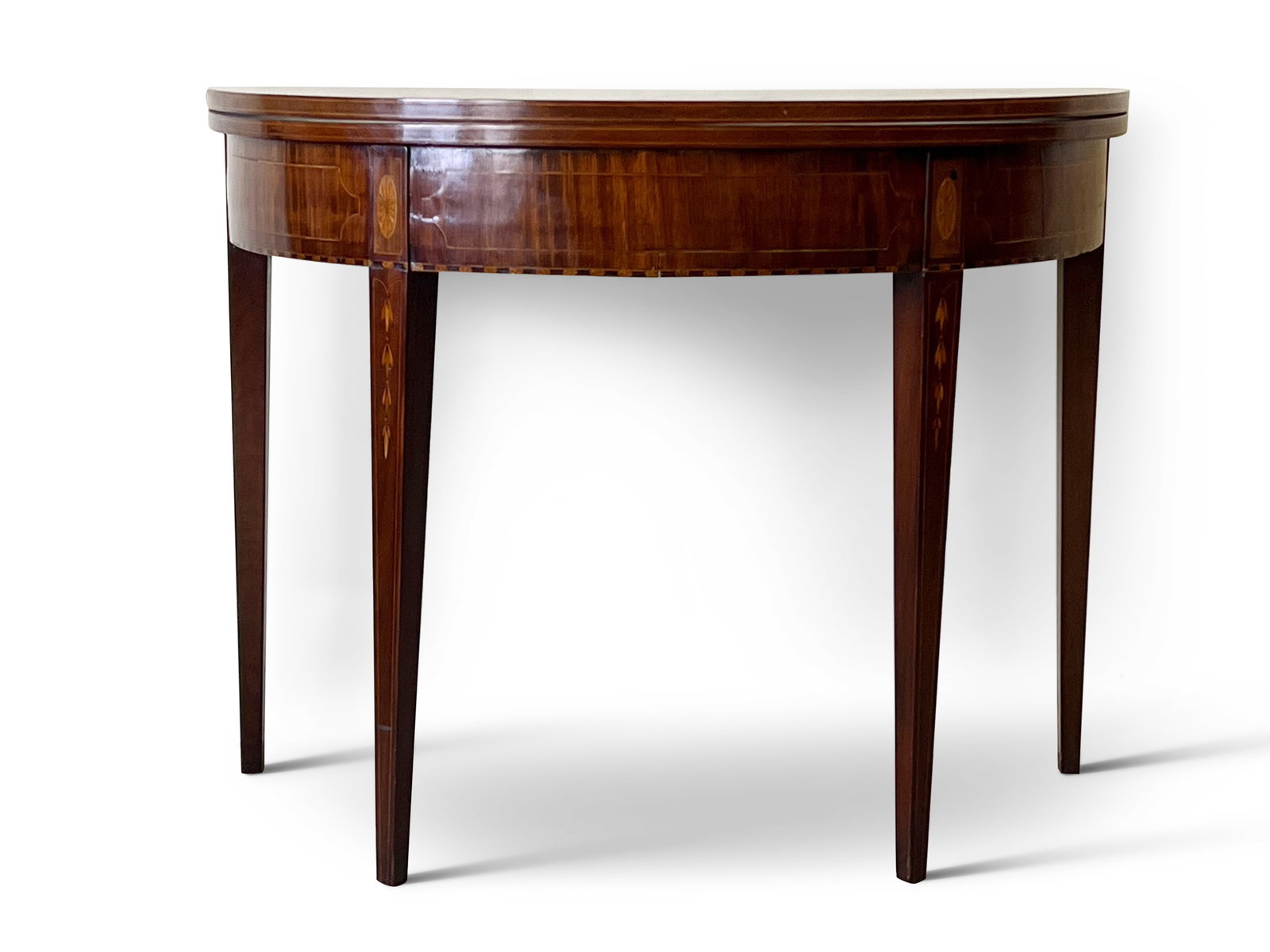 Federal Banded and Inlaid Mahogany Game Table: A Federal banded and inlaid mahogany game table of demilune form. 28-1/2in tall x 36-1/2in wide x 18-1/4in deep. | Philadelphia Metro area delivery, NYC curbside delivery, and international third-part