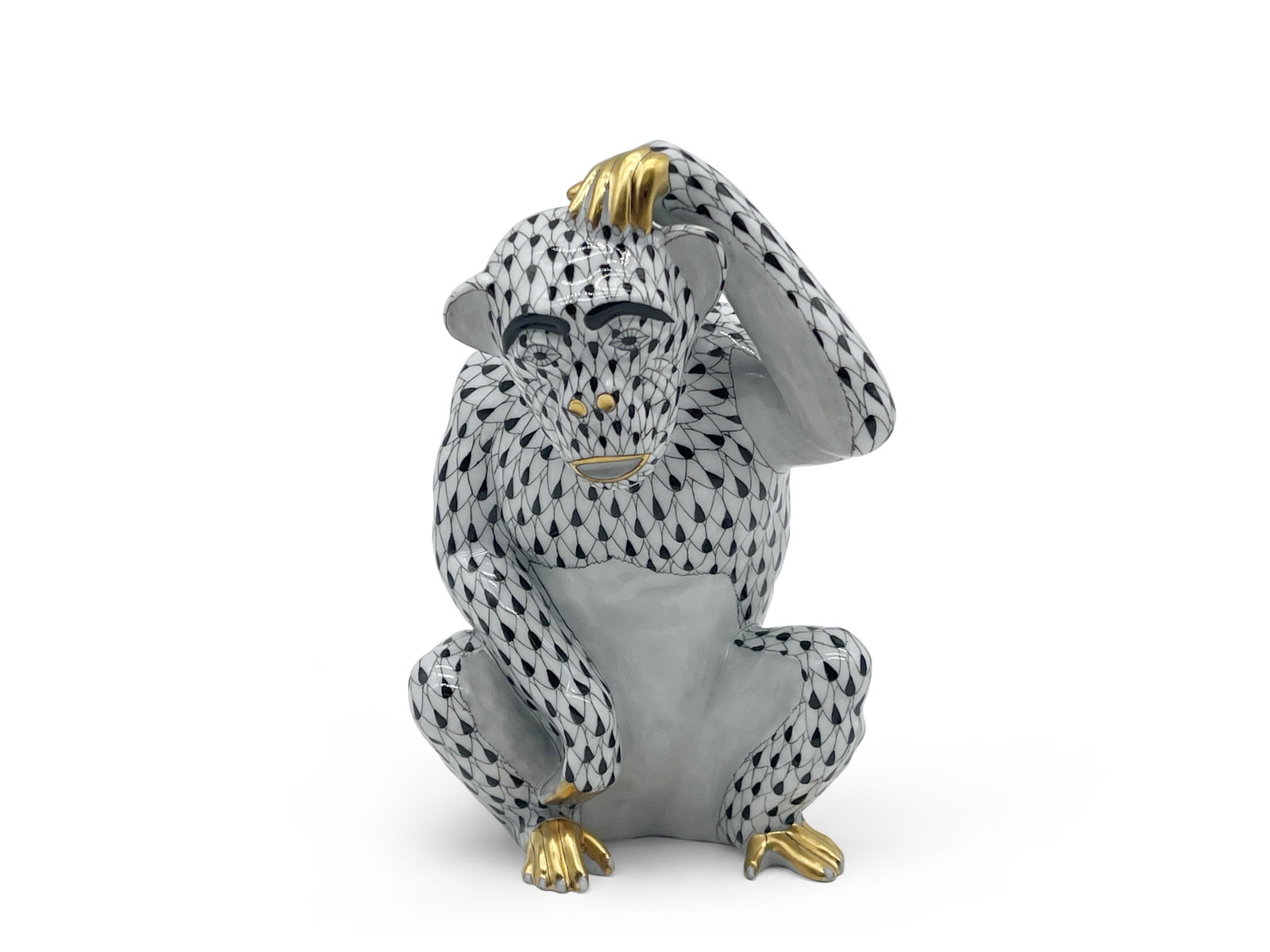 Herend Fishnet Chimpanzee: A Herend of Hungary porcelain fishnet pattern chimpanzee. Marked Herend. 6in tall x 4in wide. | Philadelphia Metro area delivery, NYC curbside delivery, and international third-party shipper informati
