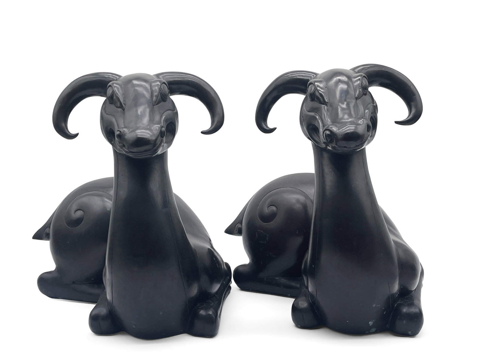 Two Mythical Goat Bronze Sculptures: A pair of cast bronze sculptures depicting mythical goats with shell-form bodies. 14in tall x 14in wide. | Philadelphia Metro area delivery, NYC curbside delivery, and international third-party shippe