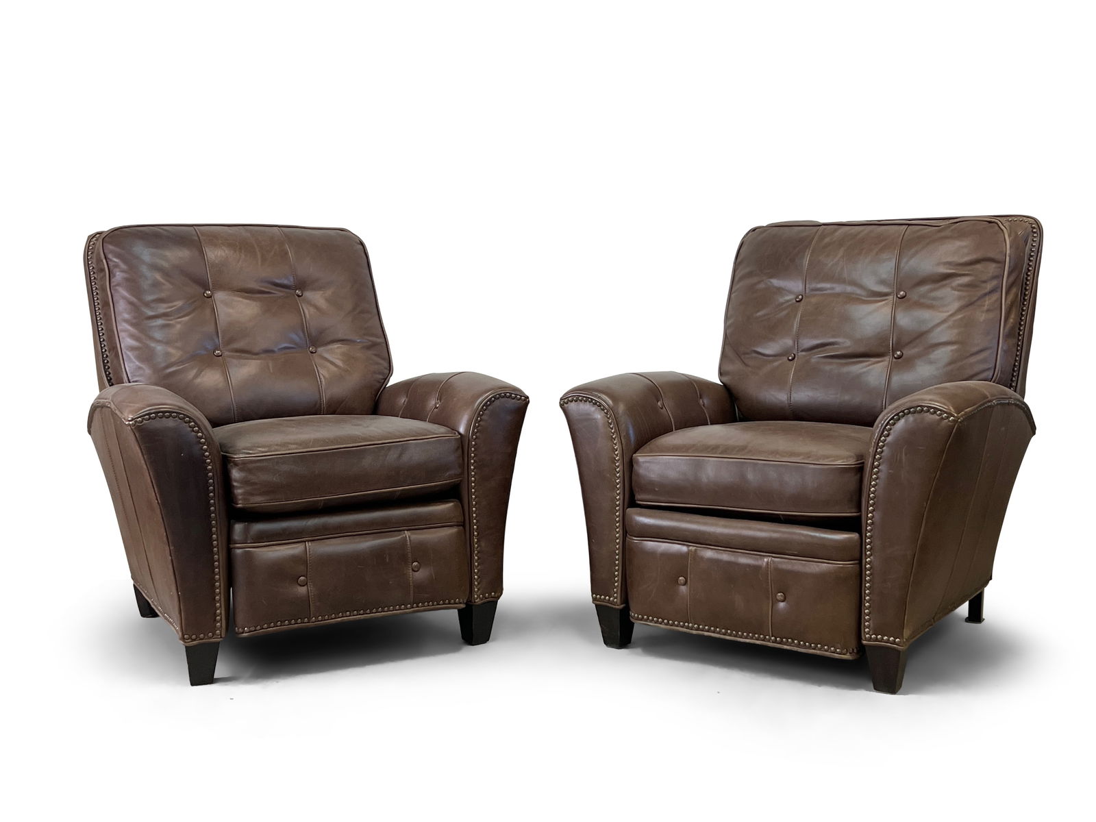 Pair of Barcalounger Leather Recliners: A pair of Barcalounger leather recliners. 39in tall x 36in wide x 36in deep. | Philadelphia Metro area delivery, NYC curbside delivery, and international third-party shipper information are all availa