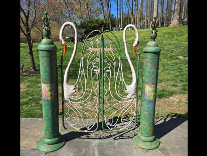 Pair of Whimsical Hand-Painted Swan Garden Gates: A pair of whimsical cast metal garden gates featuring figural swans flanking the lock. Approx. 54in tall x 54in wide. | You have additional shipping options! Philadelphia Metro area delivery, NYC curb