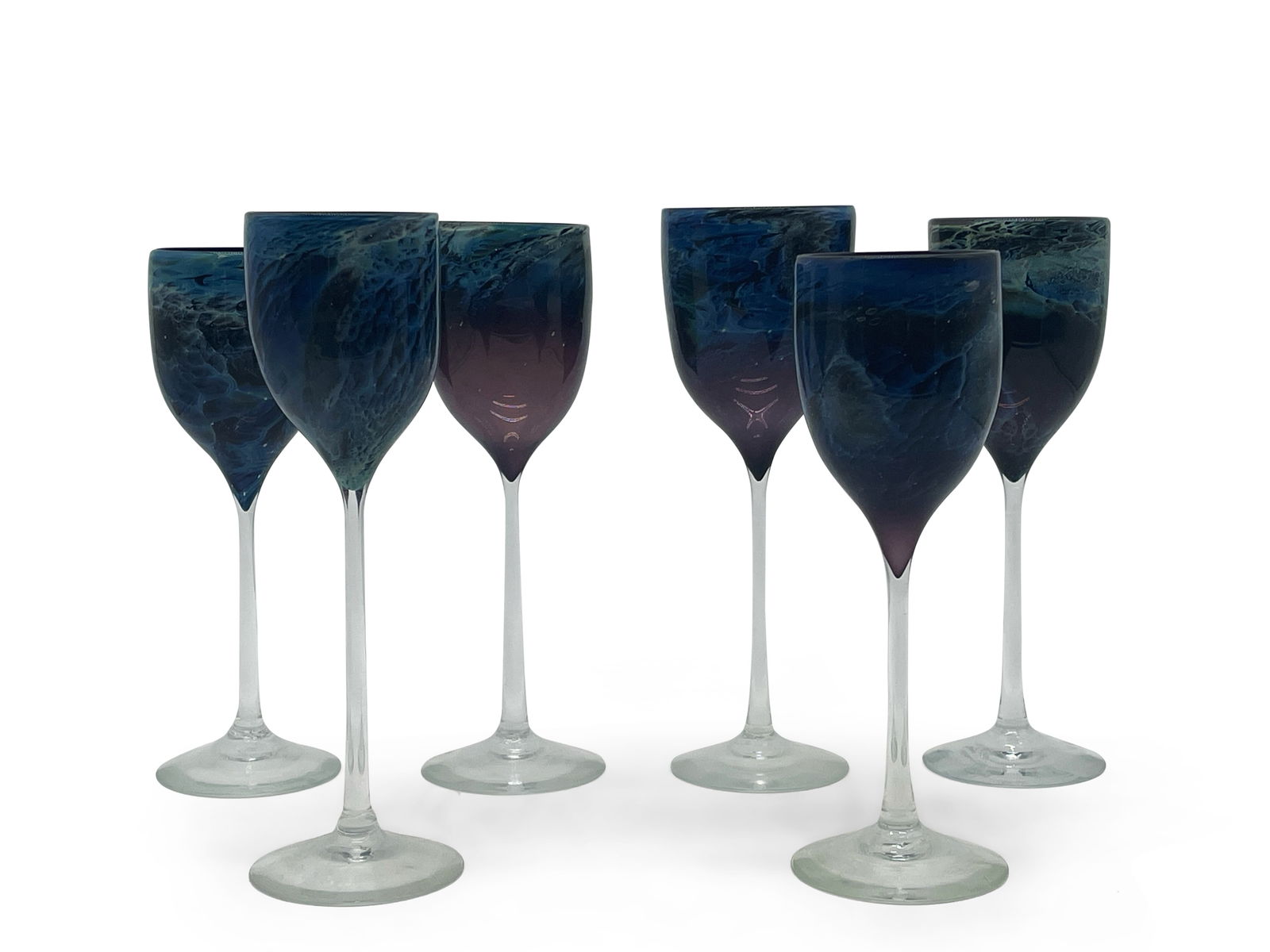 Six Josh Simpson Art Glass Wine Glasses: Six Josh Simpson "Galaxy" blown wine glasses. Largest: 9-1/2in tall x 3in wide. All glasses vary slightly in size. | You have additional shipping options! Philadelphia Metro area delivery, NYC curbsid