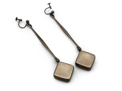 Pair of Georg Jensen Modernist Sterling Earrings: A pair of Astrid Fog for George Jensen modernist drop-style earrings with shaped square pendants. Each signed George Jensen / 925 S / Denmark/ 152. Approx. 3-3/4in long. 068 ozt. | You have additional