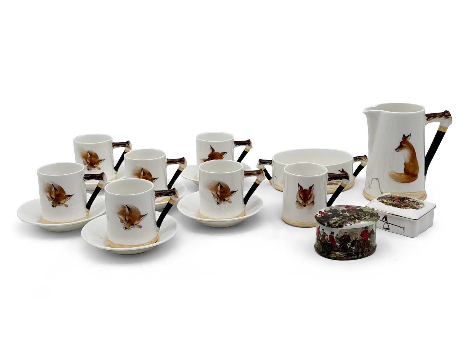 Royal Doulton Reynard The Fox China Grouping: A grouping of Royal Doulton "Reynard The Fox" china to include a creamer, sugar bowl, and seven demitasse cups, one lacking saucer, and two English bone china fox hunt-themed covered trinket boxes. Cr