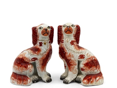 Two Staffordshire Spaniel Figures