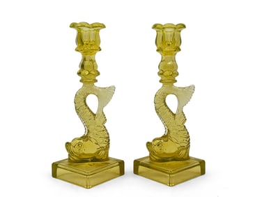 Pair of MMA Vaseline Glass Dolphin Candlesticks