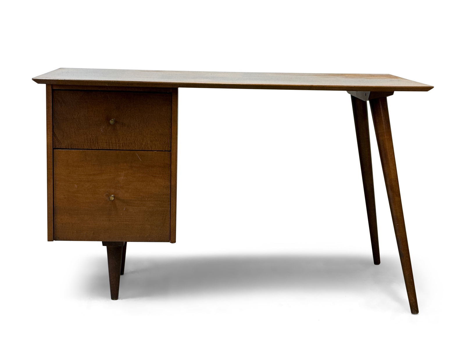 Paul McCobb Planner Group Desk: A Paul McCobb Planner Group midcentury modern maple desk on splayed legs. Foil label. 29-1/4in tall x 48in wide x 24in deep. | You have additional shipping options! Philadelphia Metro area delivery, N