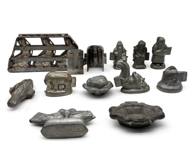 Twelve Figural Pewter Ice Cream Molds