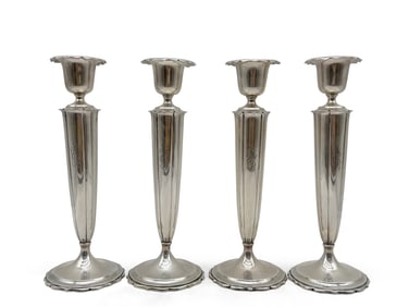 Four Sterling Weighted Candlesticks