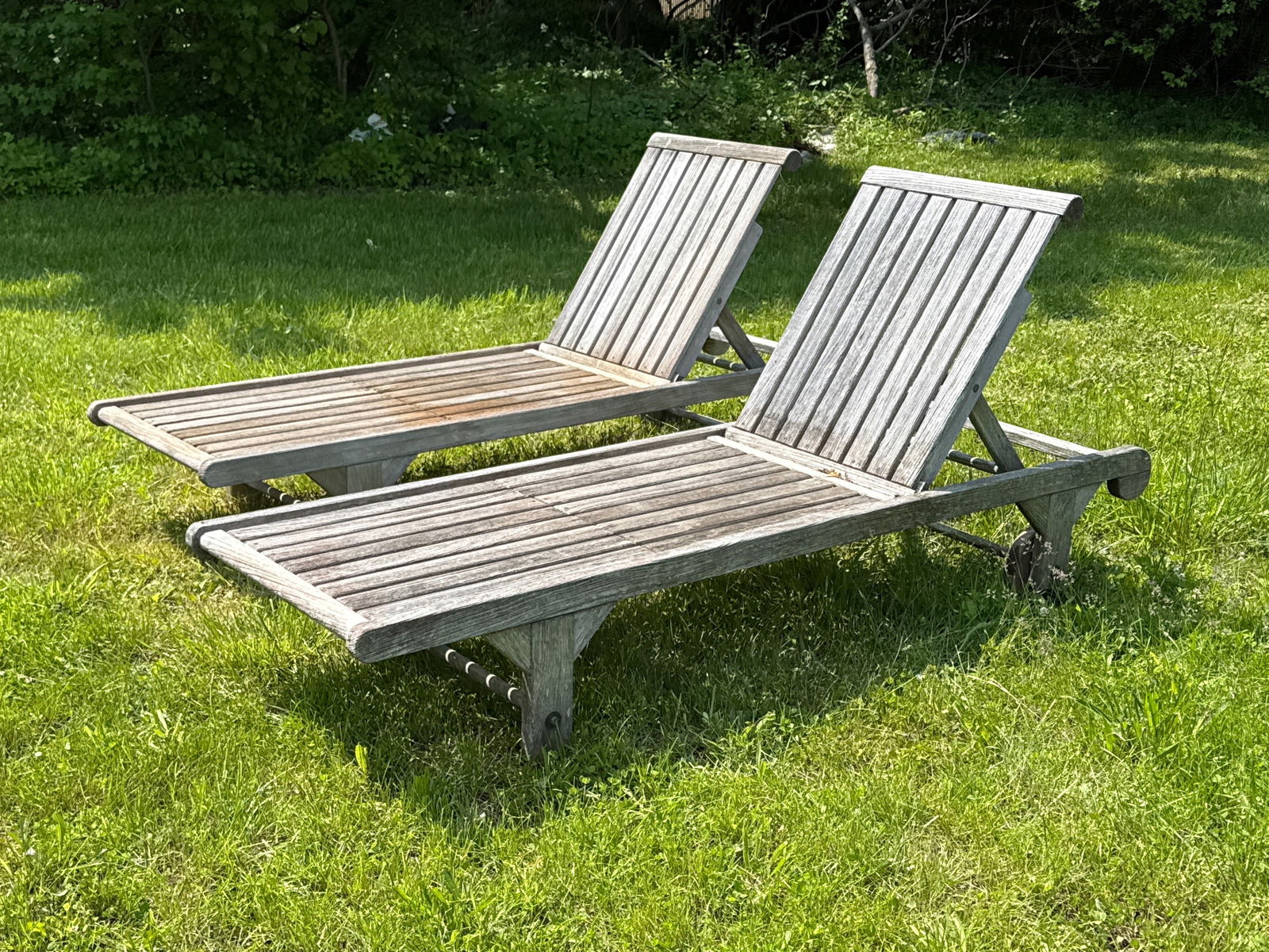 Pair of Kingsley Bate Teak Patio Chaise Lounges: A pair of Kingsley Bate teak patio chaise lounge chairs with adjustable backs and red upholstered cushions. 34in tall x 76in long x 25in wide. | You have additional shipping options! Philadelphia Metr