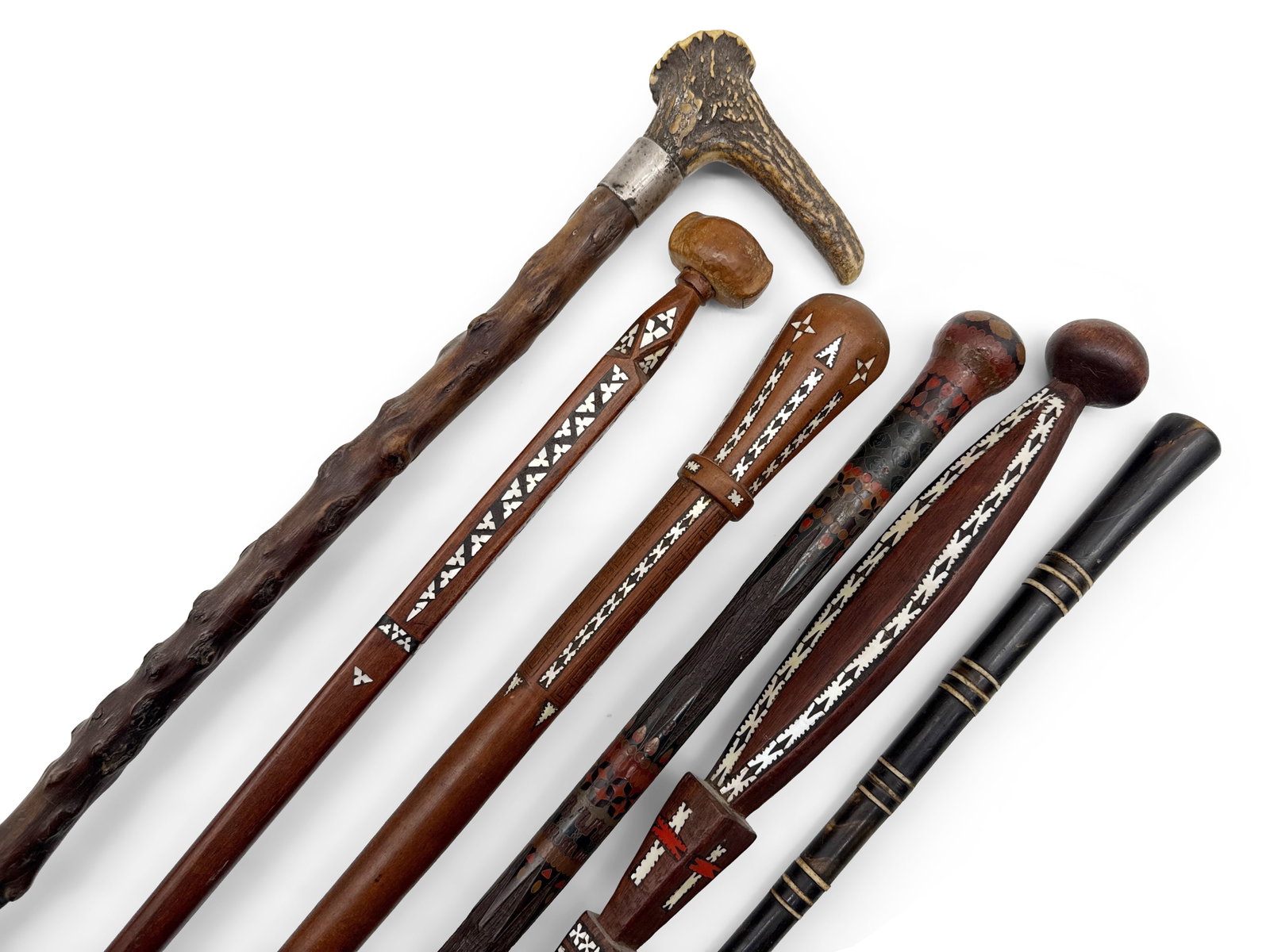 Six Canes: A grouping of six assorted canes, several with mother of pearl inlay. Longest: 36in. | You have additional shipping options! Philadelphia Metro area delivery, NYC curbside delivery, and other third-pa