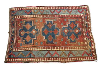 Kazak Area Carpet, 7ft 11in x 5ft 8in: A semi-antique Caucasian Kazak area carpet with three geometric medallions, 7ft 11in x 5ft 8in. | You have additional shipping options! Philadelphia Metro area delivery, NYC curbside delivery, and oth