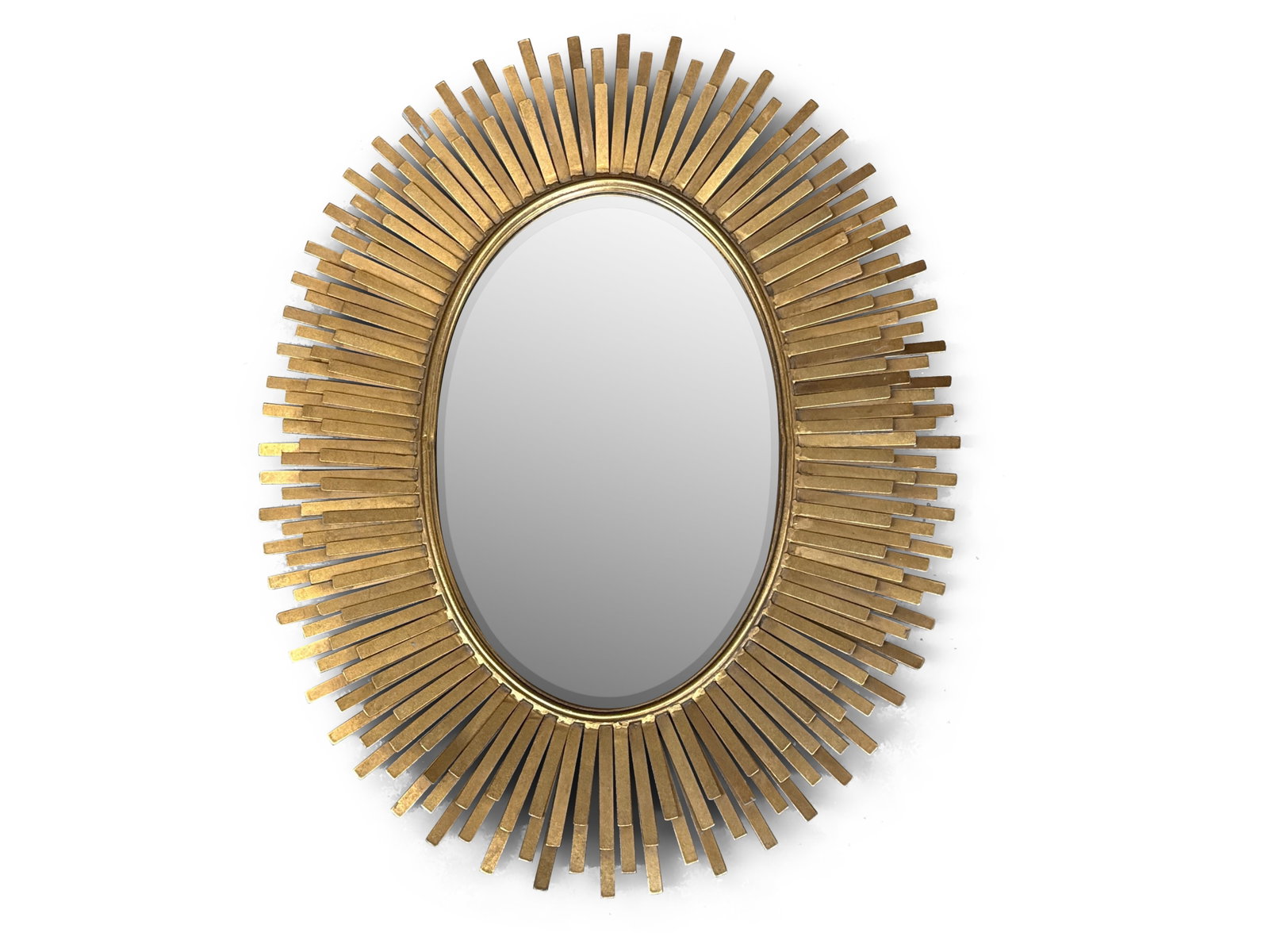 Gold Sunburst Decorator Mirror: A gold metal decorator mirror of sunburst form. 38in tall x 30in wide. | You have additional shipping options! Philadelphia Metro area delivery, NYC curbside delivery, and other third-party shipper de