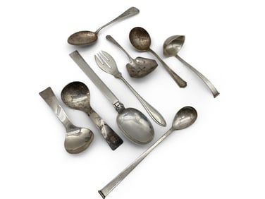 Nine Silver Serving Utensils