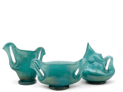 Three Ercole Barovier Murano Glass Vessels: Ercole Barovier (Italian, 20th c) Three aquamarine-colored Murano glass vessels of amorphous forms. Unsigned. Largest: 8in tall x 8in wide. | You have additional shipping options! Philadelphia Metro a