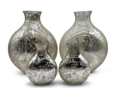 Four Silver Mercury Glass Vases: Four silver mercury glass vases with decorated leaf motif. Larger: 17in tall x 12in wide. | You have additional shipping options! Philadelphia Metro area delivery, NYC curbside delivery, and other thi