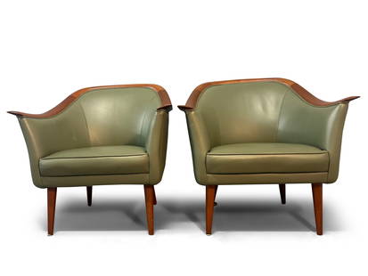 Pr. Frederick Kayser Scandinavian Teak Armchairs: A pair of Frederick Keyser Scandinavian modern teak-framed armchairs with rounded backs, raised on tapering legs. Retailed by Georg Jensen. 30in tall x 28-/2in wide x 28in deep. | You have additional
