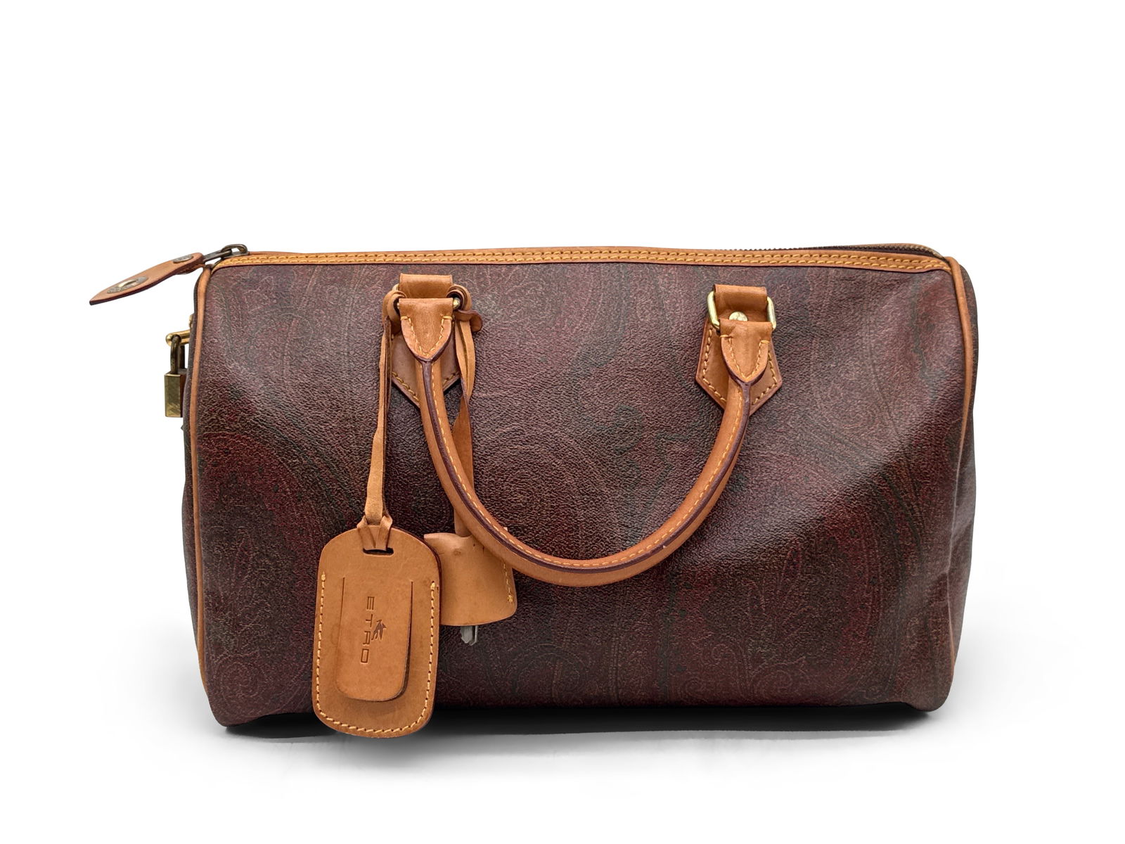Etro Paisley Boston Doctors Bag: An Etro paisley Boston Doctors bag with leather straps, branded hardware, and luggage tags. Interior has Etro label and serial number 0659103. Includes lock and keys. 8-1/2in tall x 13in wide. | You h
