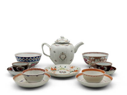 12 Pieces of Chinese Export Porcelain: A grouping to include a lidded teapot with gilt shield decoration, two bowls, a pomegranate and citrus plate, and four tea bowls and saucers. Teapot: 7in tall x 9in wide. | You have additional shippin