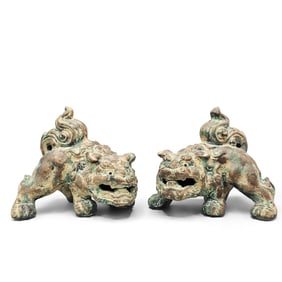Pair of Patinated Cast Iron Foo Dogs