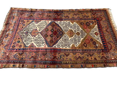 Caucasian Area Carpet, 4ft 5in x 7ft 9in: A Caucasian area carpet decorated with geometric patterns and a figural border, 4ft 5in x 7ft 9in. | You have additional shipping options! Philadelphia Metro area delivery, NYC curbside delivery, and