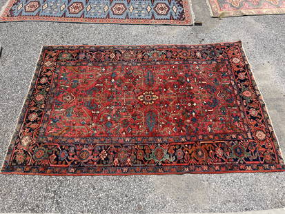 Persian Heriz Area Carpet, 5ft 11in x 9ft: A Persian Heriz area carpet with a red background and navy border. 5ft 11in x 9ft. | You have additional shipping options! Philadelphia Metro area delivery, NYC curbside delivery, and other third-part