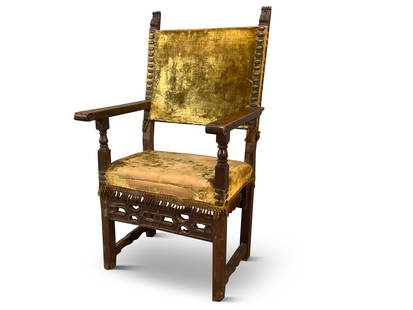 17th C. Mannerist Carved Armchair: A 17th C. Mannerist armchair with a carved walnut frame and velvet upholstery. 48in tall x 26in wide x 22-1/2in deep. | You have additional shipping options! Philadelphia Metro area delivery, NYC curb