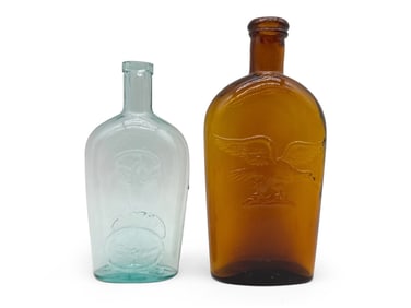 Two American Eagle Glass Flasks
