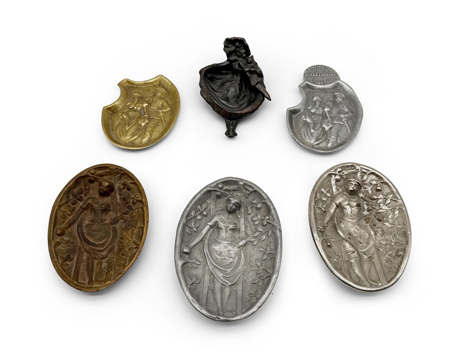 Six Cast Metal Naughty Trays: Six cast metal figural "naughty" trays. Largest: 6in tall x 3in wide. | You have additional shipping options, and are not required to use Live Shipping! Additional third-party shipper details; Philade