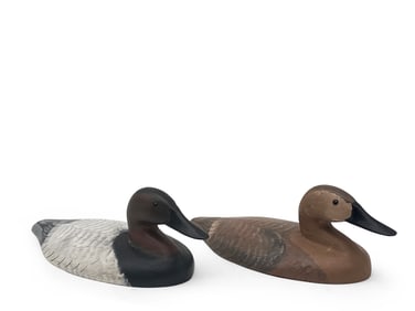 Pair of Robert Litzenberg Cast Iron Sinkbox Decoys
